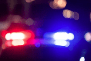The image depicts a car accident scene